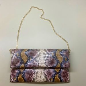 Express New no tags Snakeskin Foldover Clutch with chain.